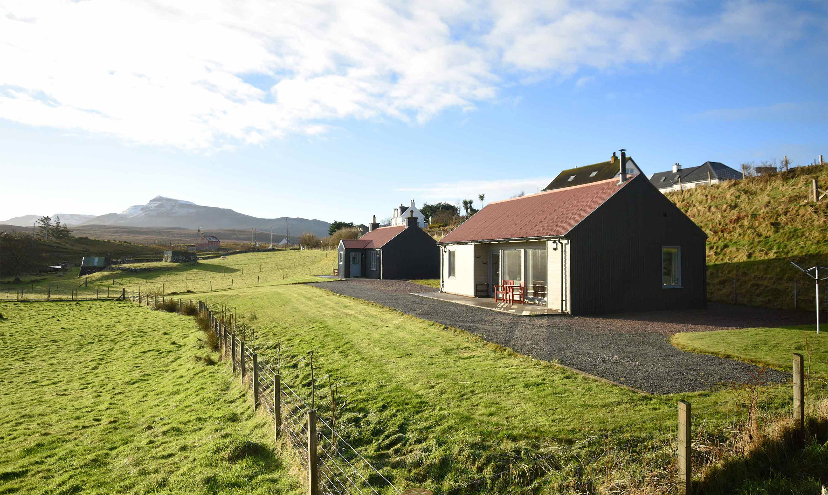 Enjoy spectacular mountain views of the Isle of Skye when you stay at Brogaig Cottages in Staffin